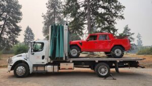 Lamborghini LM002 SUV on Enclosed Tow Truck