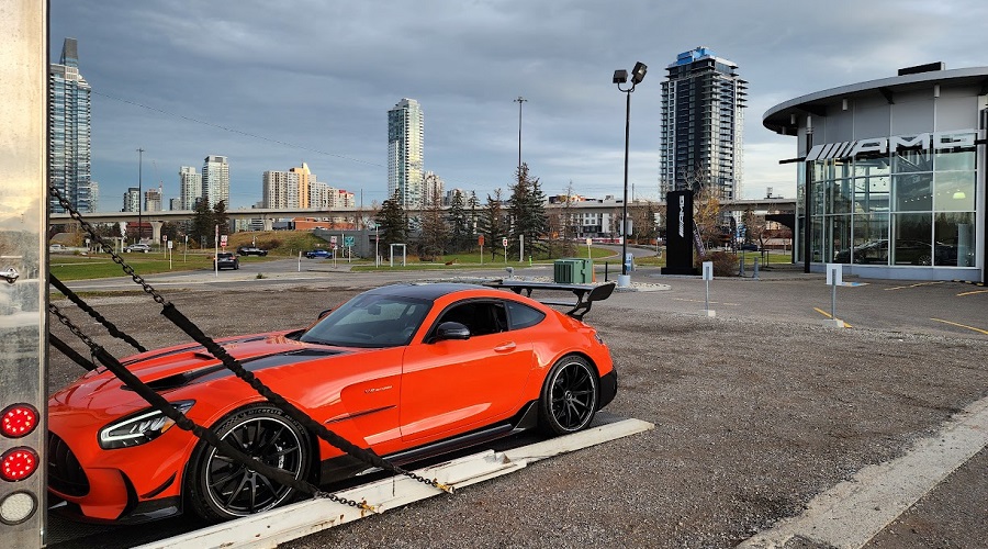 Mercedes-Benz AMG GTR Black Series loading onto specialty liftgate exotic transporter