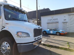 Collector grade Ford GT loading onto our specialty vehicle transporter